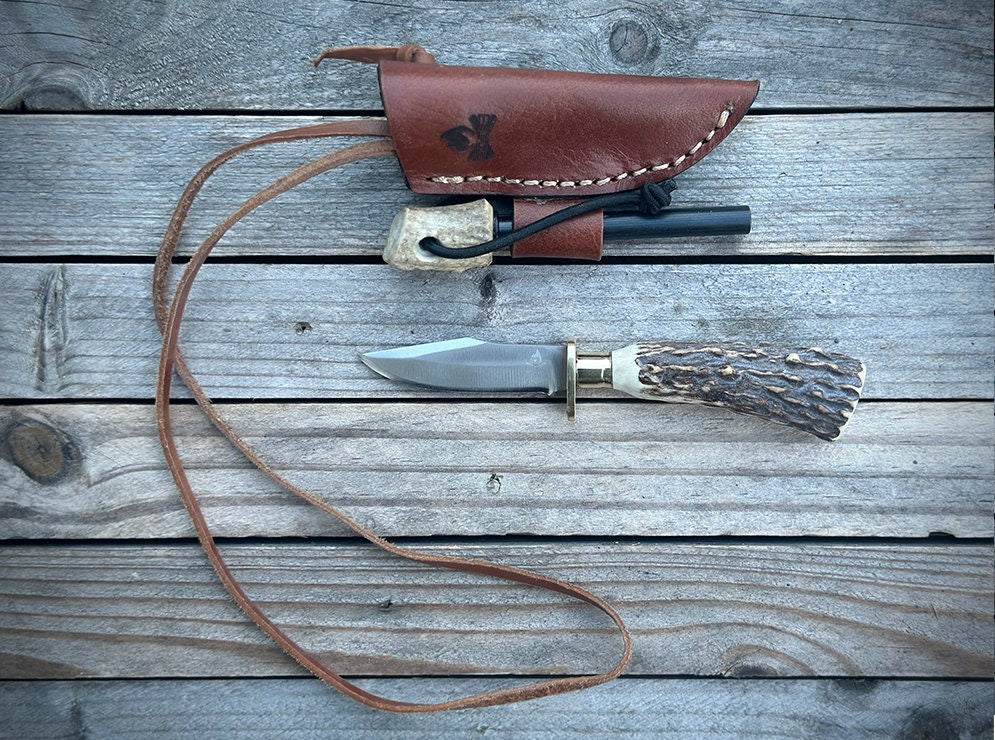 All hand made Custom Stag Horn Neck Knife w/ leather Sheath and ferro rod holder.