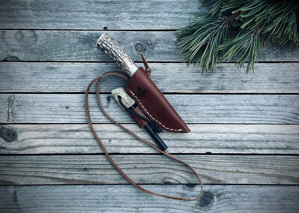 All hand made Custom Stag Horn Neck Knife w/ leather Sheath and ferro rod holder.